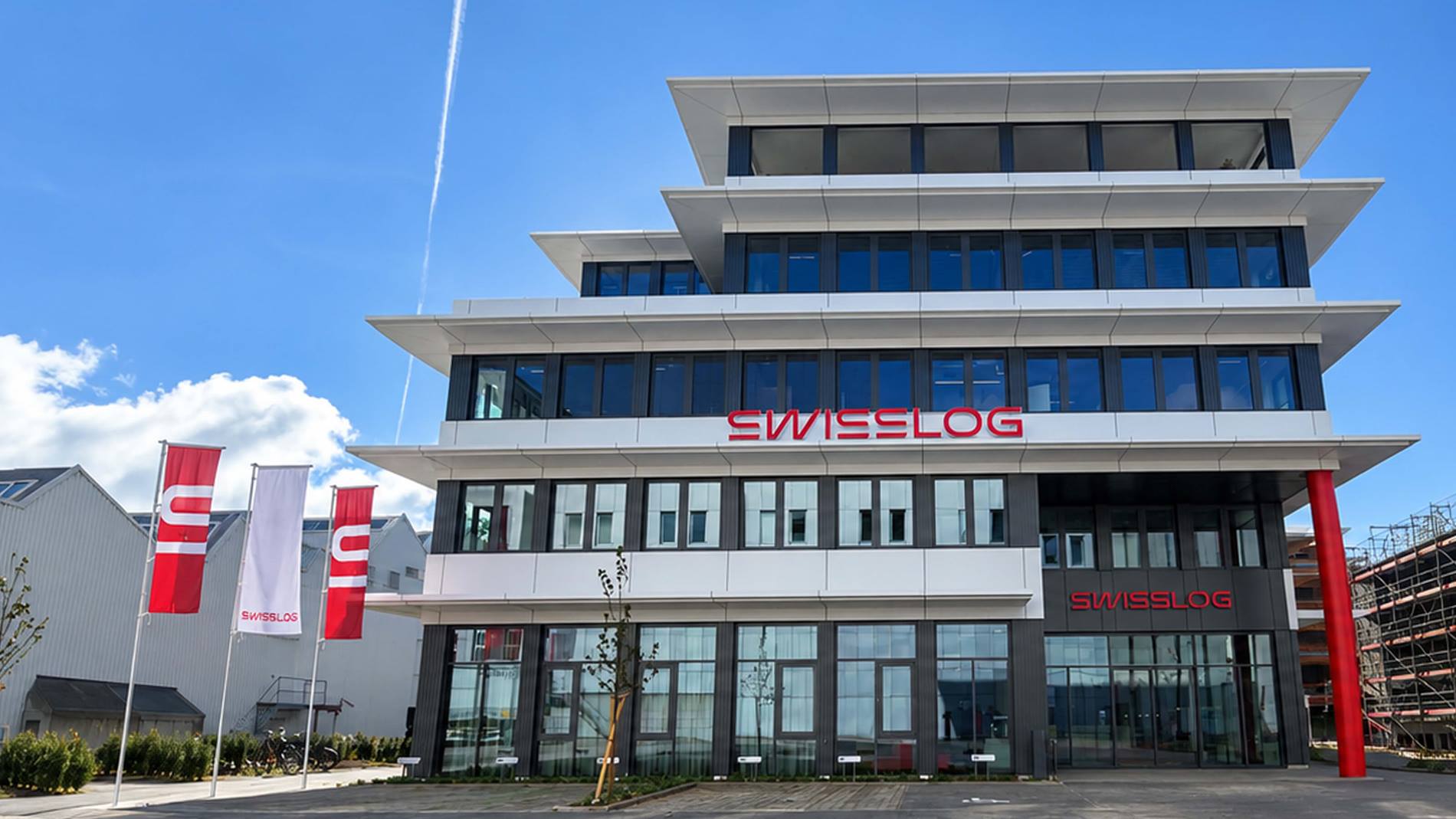 Exterior of the Swisslog global headquarters in Aarau, Switzerland, showcasing the company's modern office building