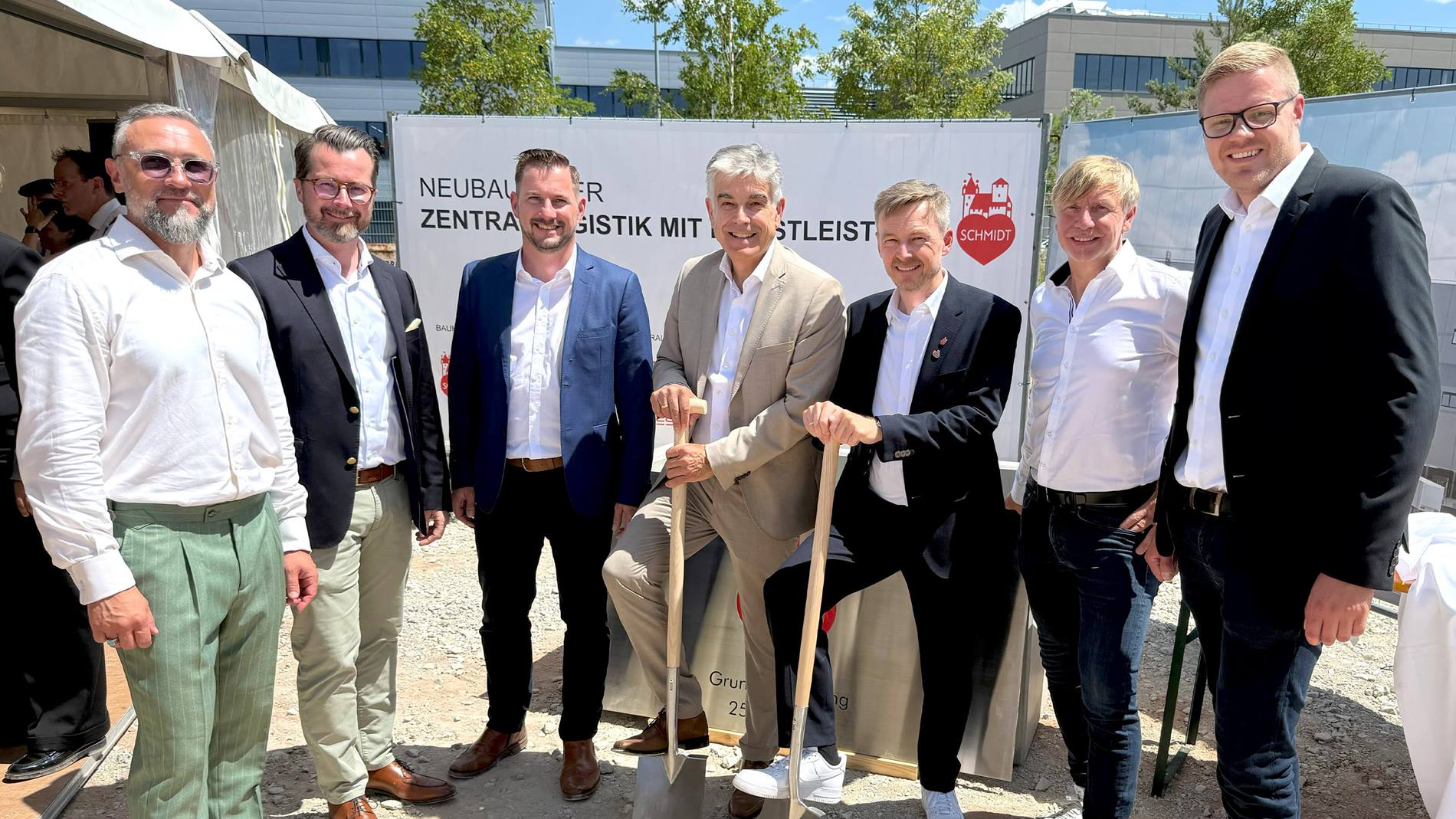 Executives from Swisslog and Lebkuchen-Schmidt at the groundbreaking ceremony for the new automated distribution centre in Nuremberg, Germany.
