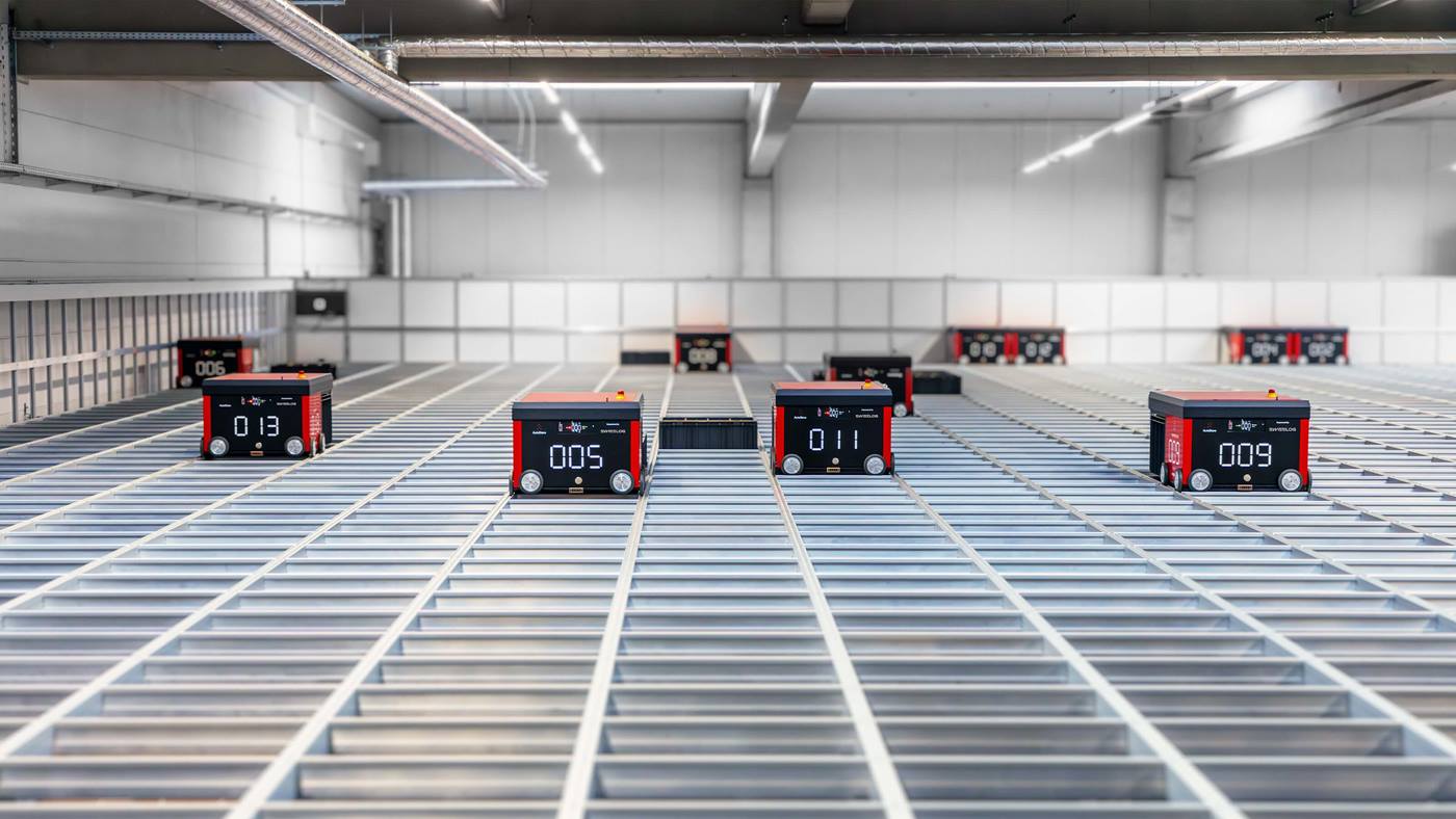 Swisslog AutoStore robots at Bleker