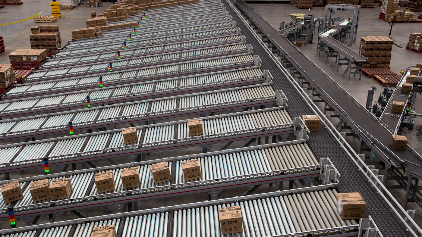 View of boxes on conveyor in warehouse