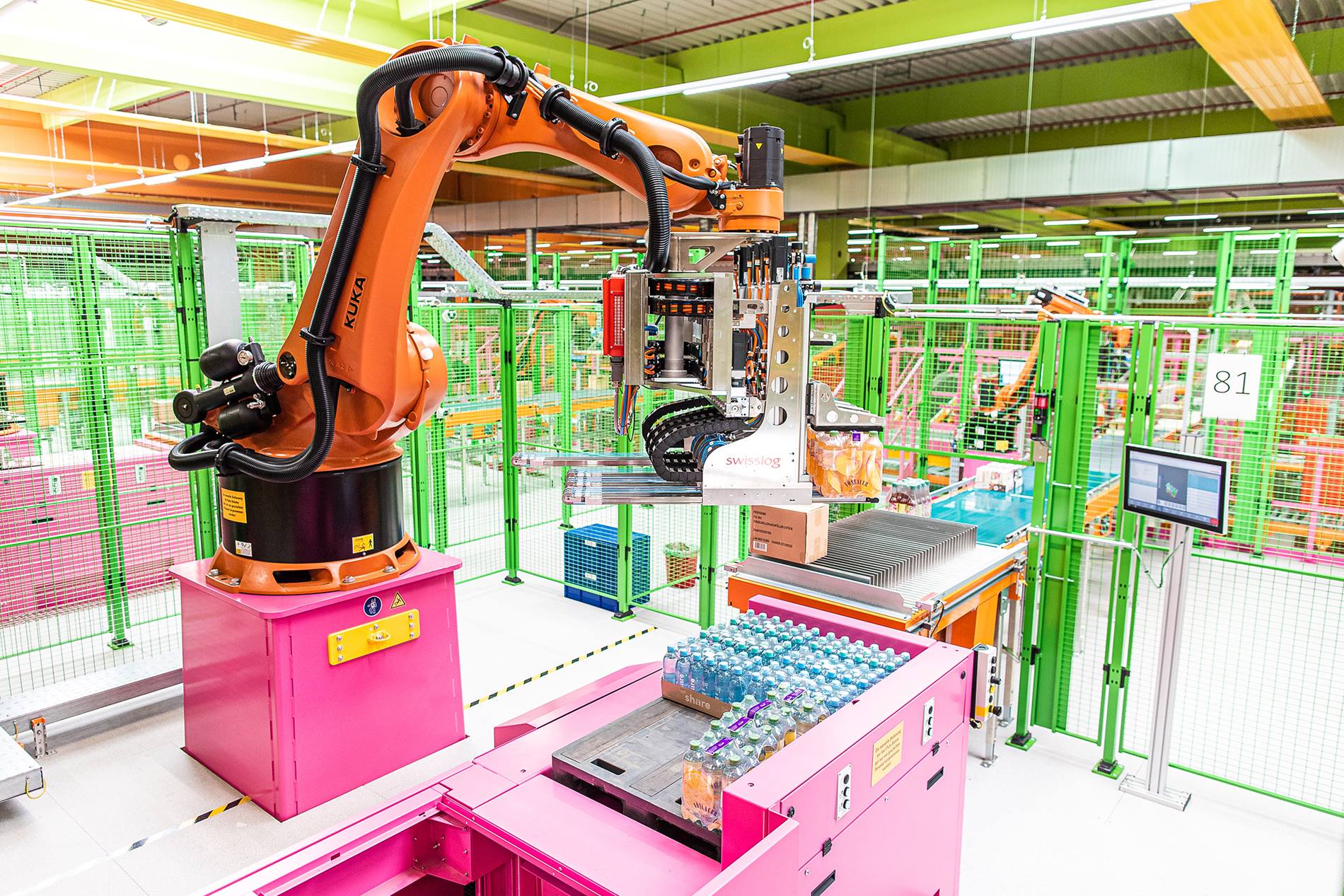 Swisslog’s ACPaQ solution performing mixed case palletizing in a dm-drogerie markt warehouse.