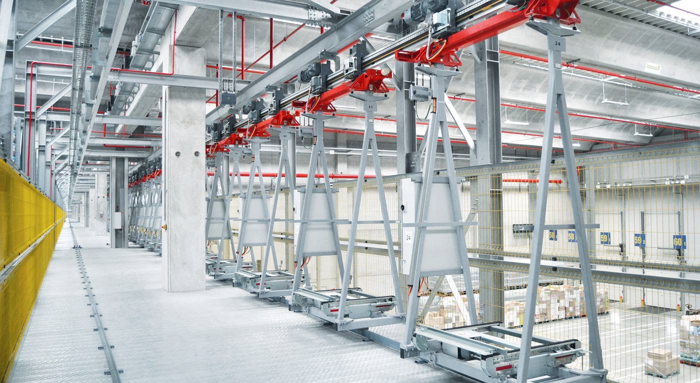 Swisslog electrified monorail system provides fast and efficient pallet transportation.