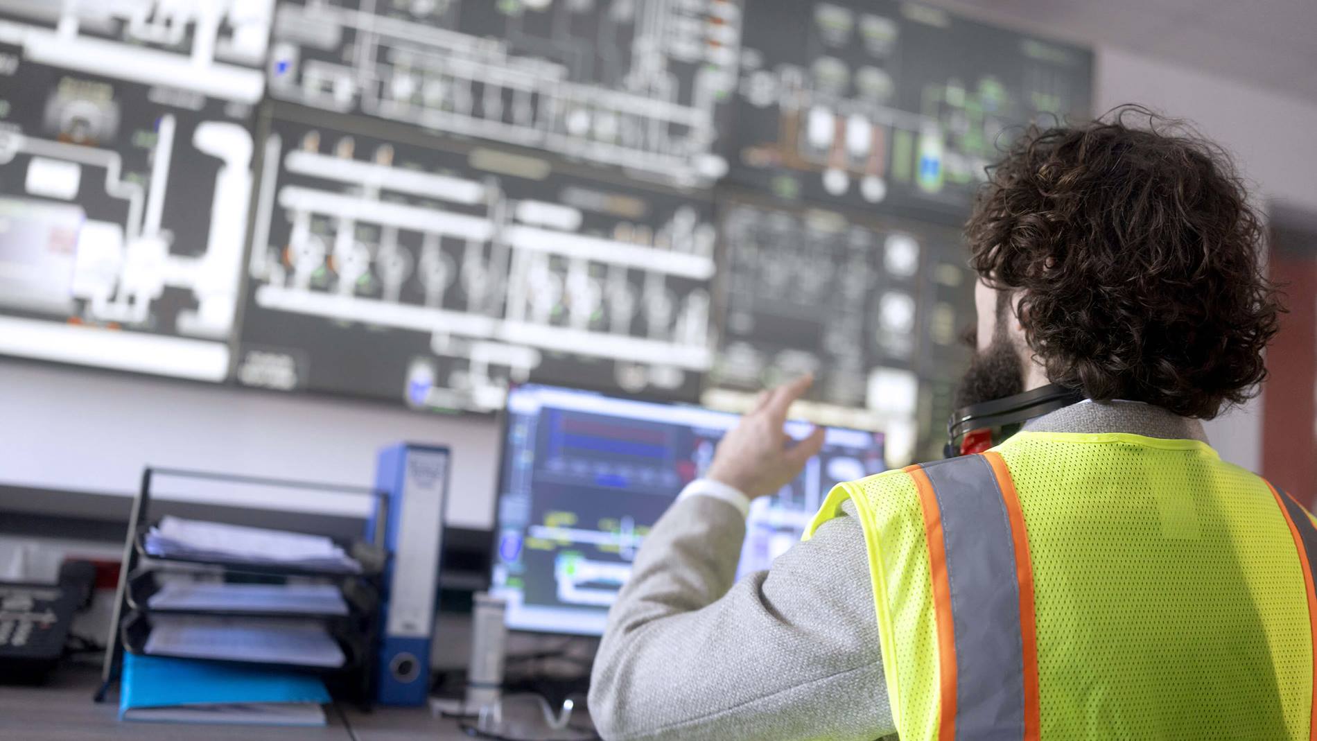 Warehouse engineer looking at warehouse management systems
