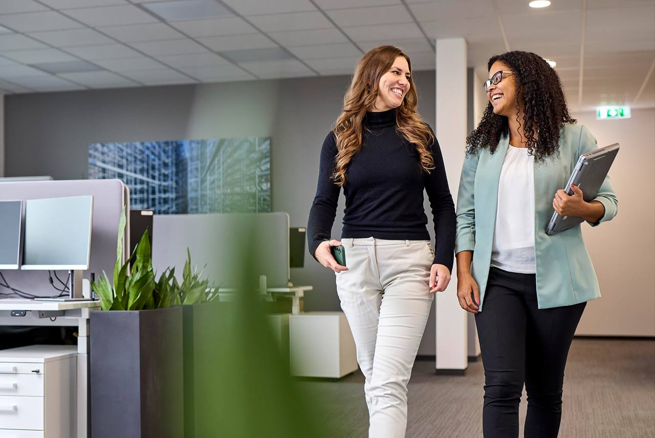Two Swisslog logistics automation employees in the Dortmund office